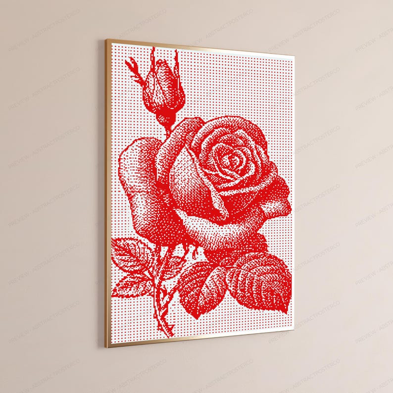 Pode incluir: Uma impress&atilde;o de arte de parede emoldurada apresentando uma rosa vermelha e um bot&atilde;o de rosa renderizados em um padr&atilde;o de pontos sobre um fundo branco. A obra exibe uma composi&ccedil;&atilde;o floral detalhada com uma rosa em flor, um bot&atilde;o e folhas.