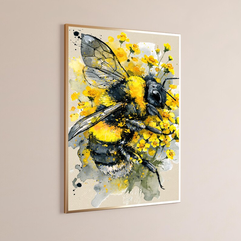 May include: A framed watercolor-style wall art print featuring a detailed bumblebee with black and yellow fuzzy stripes, translucent wings, and dark legs, surrounded by clusters of small yellow flowers and soft gray paint splatters.