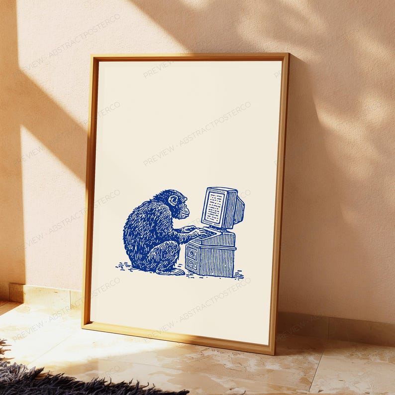 May include: A vertical rectangular framed print featuring a blue ink-style illustration of a chimpanzee sitting at a vintage computer desk. The primate is depicted typing on a keyboard with a monitor and tower unit, set against a plain cream background.