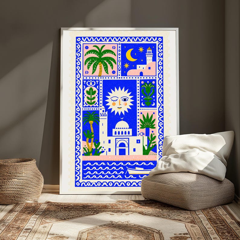 May include: A rectangular wall art print featuring a vibrant blue, white, and pink illustration. The design includes a central winking sun, a mosque with a dome, palm trees, a crescent moon, stars, and a small boat on wavy water, all framed by a decorative blue border.