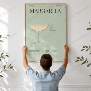Margarita Cocktail Recipe Print, held up in a room