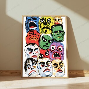 May include: A rectangular wall art print in a light wood frame featuring a collage of colorful, stylized monster and human faces in shades of blue, yellow, red, green, and purple, with a white background and a repeating watermark text pattern.