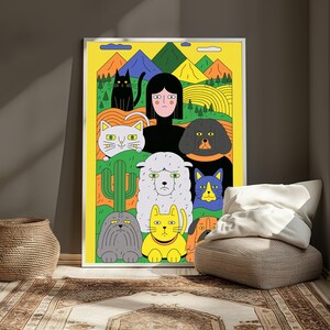May include: A rectangular wall art print featuring a yellow background with a central figure surrounded by various animals including cats, a dog, and a sheep. The scene includes stylised mountains, rolling hills, and a cactus in a flat, graphic illustration style.