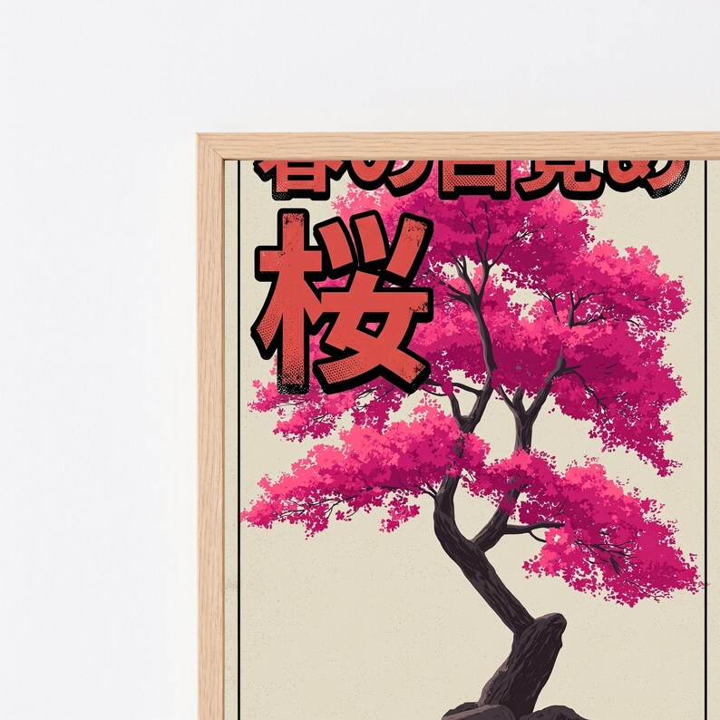 May include: A framed wall art print featuring a stylized cherry blossom tree with vibrant pink foliage and a dark brown trunk. The background is a light cream color. Large black Japanese kanji characters are printed above the tree.