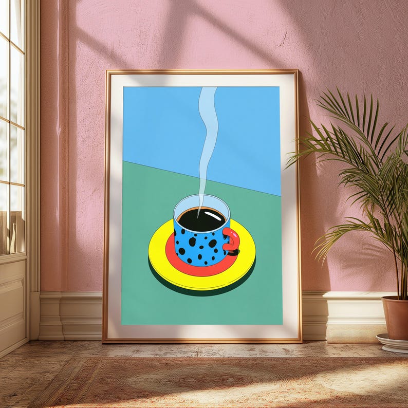 May include: A framed art print featuring a graphic illustration of a blue coffee mug with black polka dots and a red handle, resting on a yellow saucer. The mug contains dark coffee with a thin, light blue wisp of steam rising upwards.