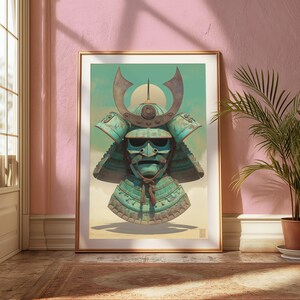 May include: A framed wall art print featuring a teal and weathered bronze samurai helmet with a prominent crescent-shaped crest, a face mask with a mustache, and a neck guard, set against a pale yellow background with a circular sun motif.