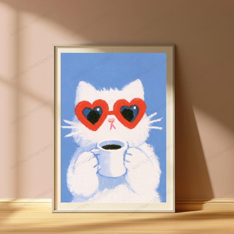 May include: A framed art print featuring a fluffy white cat wearing bright red heart-shaped sunglasses. The cat is holding a white mug filled with dark coffee against a solid light blue background. The illustration has a soft, textured appearance.