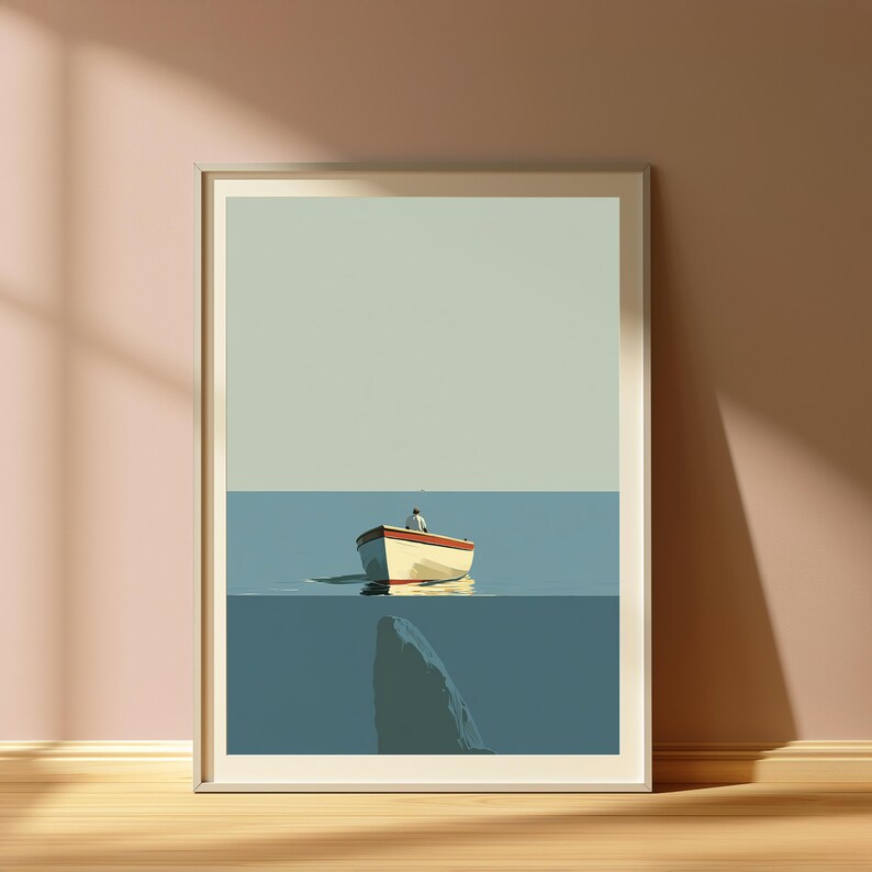May include: A framed art print featuring a small white boat with a red trim floating on calm blue water under a pale green sky. A person sits inside the boat, and a large dark shape resembling a whale tail is visible beneath the water surface.