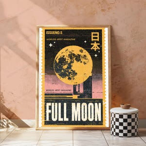 May include: A rectangular wall poster featuring a large yellow full moon against a black and pink background. The design includes the text ISSUENO.5, WORLDS BEST MAGAZINE, the Japanese characters 日本, and the words FULL MOON in bold letters.