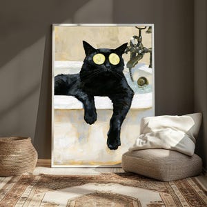 May include: A framed wall art print depicting a black cat relaxing in a white bathtub. The cat has two yellow cucumber slices placed over its eyes. A metallic faucet fixture is visible in the background against a soft, neutral-toned wall.