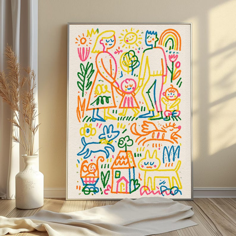 May include: A framed wall art print featuring a colorful, hand-drawn style illustration of a family with two children, a dog, a cat, a house, and a sun. The vibrant artwork uses bold lines in red, yellow, blue, green, and orange on a cream background.