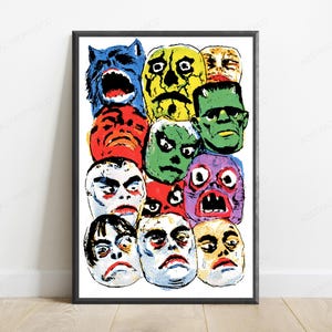 May include: A framed poster featuring a collage of colorful, stylized monster and creature faces in a comic book art style. The illustration includes a blue wolf, a yellow skull, a green Frankenstein-like figure, and various other expressive faces.