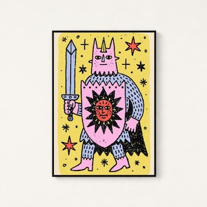May include: A rectangular art print featuring a stylised pink creature with a horn, wearing blue chainmail armour and a black cape. The figure holds a grey sword and a pink shield with a black sun design against a yellow background with stars.