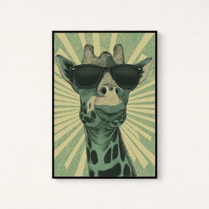 May include: A framed wall art print featuring a stylized illustration of a giraffe wearing black sunglasses. The giraffe has dark brown spots on a light green background with a radiating sunburst pattern in muted yellow and green tones.