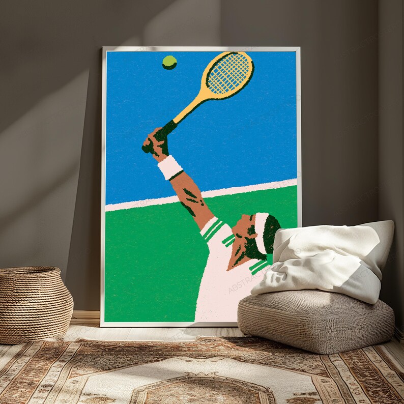 May include: A vertical wall art print featuring a stylised illustration of a tennis player in a white shirt and headband, reaching up with a yellow racket to hit a tennis ball. The scene depicts a blue sky above a green tennis court surface.