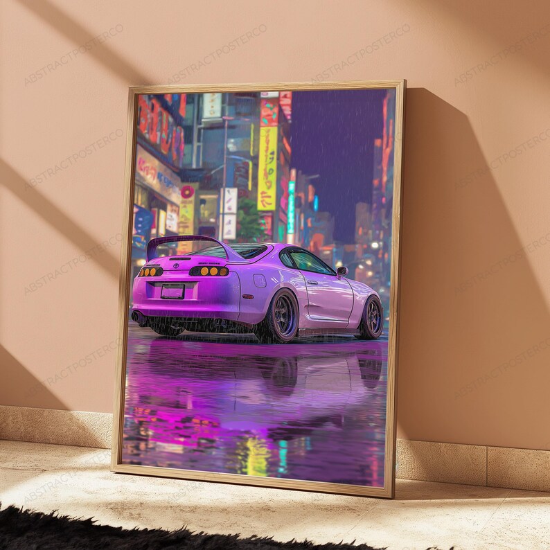 May include: A framed vertical poster featuring a purple sports car parked on a wet surface at night. The background displays a vibrant city street with illuminated signs and buildings. The car is reflected in the water on the ground below.