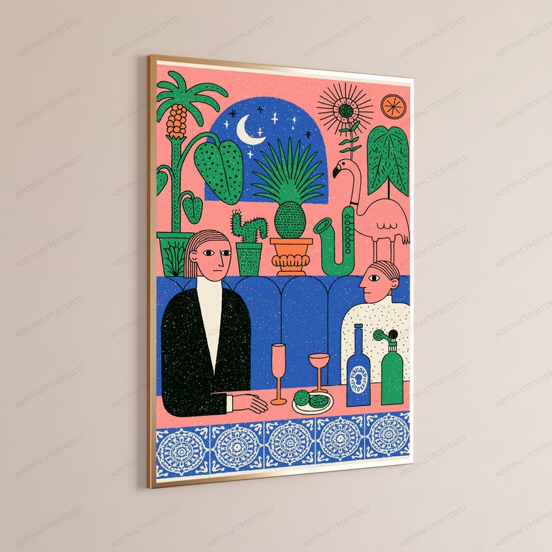 May include: A framed wall art print featuring a stylized illustration of two people sitting at a table with drinks. The scene includes a pink background, a blue arched window with a moon, various potted plants, a flamingo, and a decorative tile border.