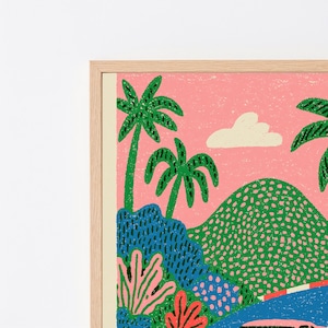 May include: A framed art print featuring a stylised tropical landscape with a pink sky, a white cloud, green palm trees, and textured hills in shades of green and blue. The illustration uses a grainy, screen-printed aesthetic with bold colours.