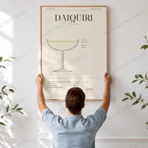 Daiquiri Cocktail Recipe Print in Cream, held up in a room