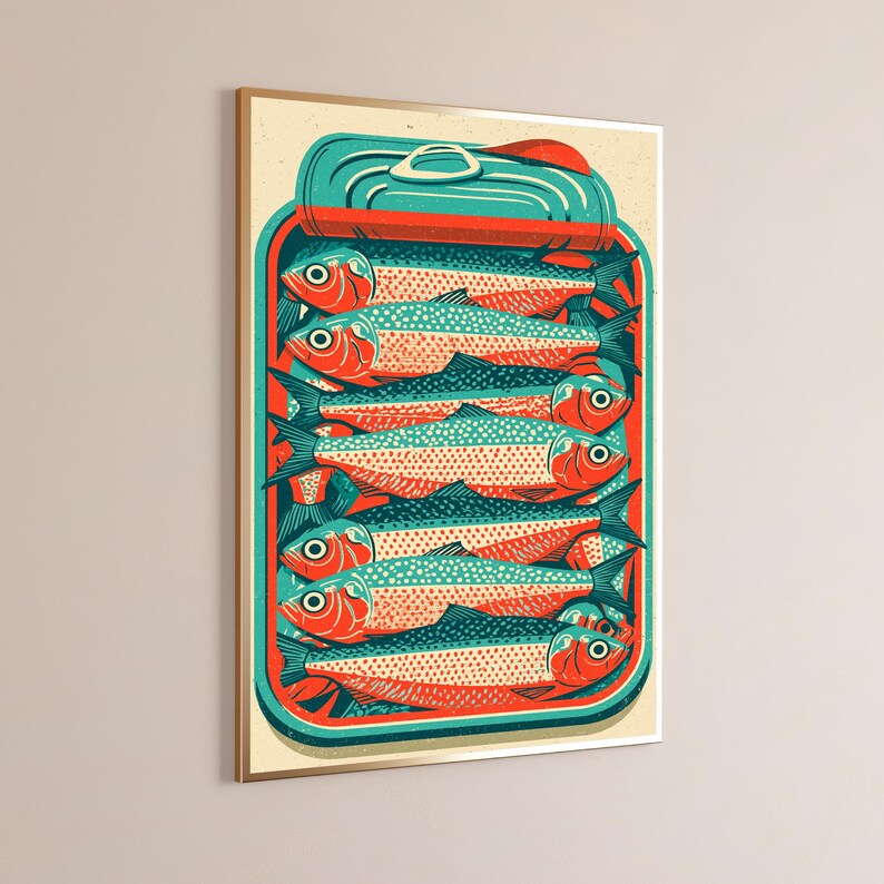 May include: A framed wall art print featuring a stylized illustration of a tin of sardines. The artwork displays multiple fish stacked horizontally in a teal and orange color palette, with a partially opened lid at the top of the rectangular container.