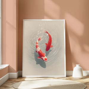 May include: A framed vertical wall art print featuring two koi fish swimming in a circular motion within light gray water. One fish is solid red, while the other displays a white and red patterned body. Small bubbles rise from the center of the water.