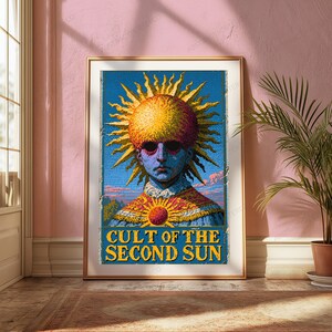 May include: A rectangular poster featuring a central figure with a large, textured yellow sun-shaped head, dark sunglasses, and a blue face. The figure wears a patterned garment with a small sun emblem. The text CULT OF THE SECOND SUN is at the bottom.