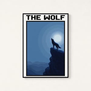 May include: A rectangular wall art print featuring a pixelated illustration of a wolf howling at a full moon from a cliff edge. The scene is rendered in shades of blue and black, with the text THE WOLF printed in a bold, black pixelated font at the top.