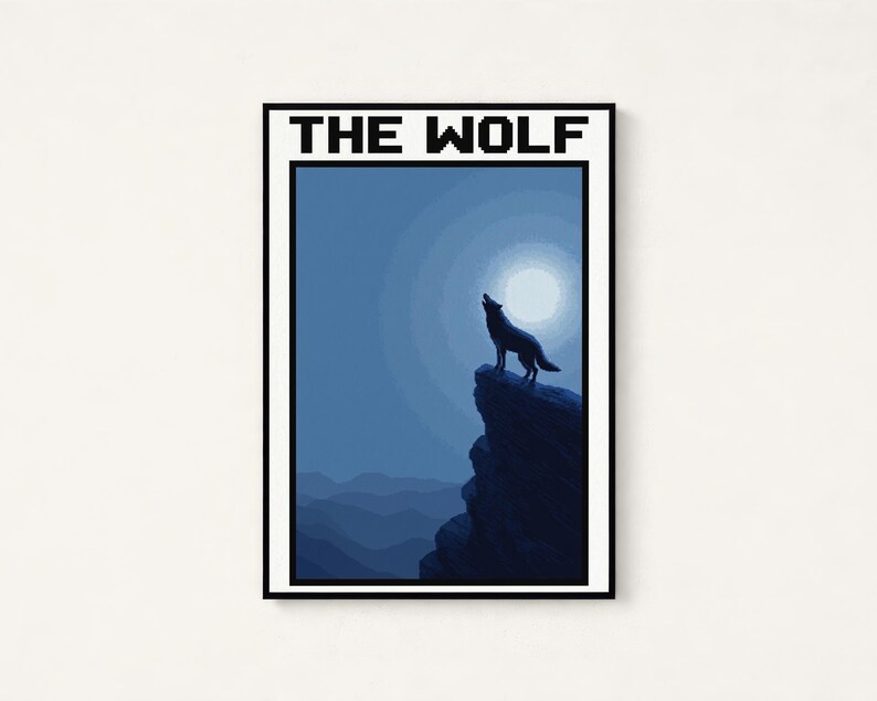 May include: A rectangular wall art print featuring a pixelated illustration of a wolf howling at a full moon from a cliff edge. The scene is rendered in shades of blue and black, with the text THE WOLF printed in a bold, black pixelated font at the top.