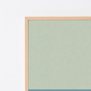 May include: A rectangular wall art piece featuring a light sage green upper section and a solid dark blue lower section, enclosed within a light-toned wooden frame. The composition is divided horizontally by a clean, straight line.