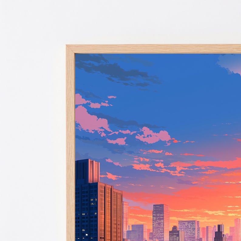 May include: A framed digital art print depicting a city skyline at sunset. The sky features vibrant gradients of deep blue, soft pink, and bright orange clouds. Tall skyscrapers with illuminated windows stand against the colorful horizon.