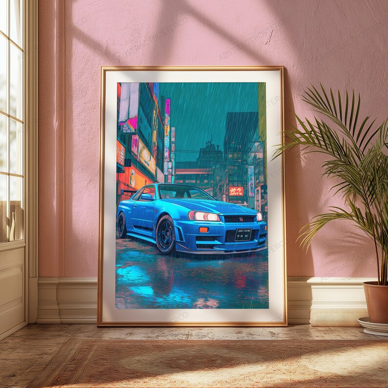 May include: A framed wall art print depicting a bright blue sports car parked on a wet city street at night. The scene features tall buildings with glowing neon signs in the background, reflecting on the rain-slicked pavement under a teal sky.