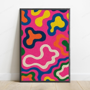 May include: A rectangular wall art piece featuring a vibrant, textured surface with an abstract pattern of irregular, amoeba-like shapes in bright pink, yellow, orange, dark blue, green, and cream colors, enclosed in a thin black frame.