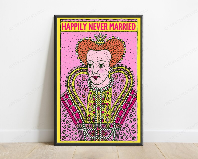 May include: A framed wall art print featuring a stylized illustration of a monarch with red hair and a crown, wearing an ornate yellow and pink gown. The text "HAPPILY NEVER MARRIED" is printed in bold pink letters at the top of the yellow border.