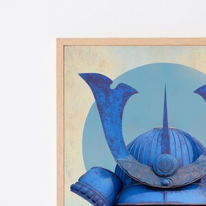 May include: A framed wall art print featuring a vibrant blue samurai helmet with a prominent central crest and ornate detailing. The helmet is set against a pale yellow background with a large, light blue circular shape behind the headpiece.