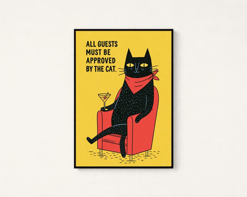 May include: A rectangular wall art print featuring a black cat wearing a red bandana, sitting in a red armchair, holding a martini glass. The yellow background includes the black text: ALL GUESTS MUST BE APPROVED BY THE CAT.