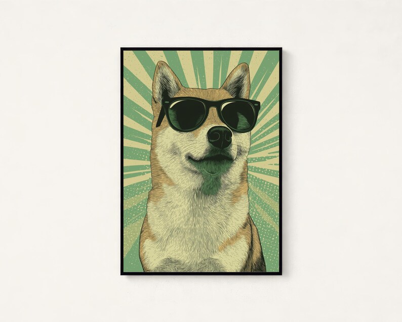 May include: A framed wall art print featuring a tan and white Shiba Inu dog wearing black sunglasses. The background consists of a light green and cream-coloured sunburst pattern with a dotted texture, all enclosed within a thin black frame.