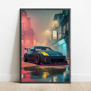 May include: A framed wall art print depicting a dark grey sports car with yellow headlights parked on a wet city street at night. The scene features neon signs, tall buildings, and reflections on the ground, captured in a vertical orientation.