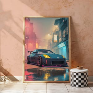 May include: A framed wall art print depicting a dark sports car with yellow headlights parked on a wet city street at night. The scene features tall buildings, glowing neon signs, and reflections on the ground in shades of pink and blue.