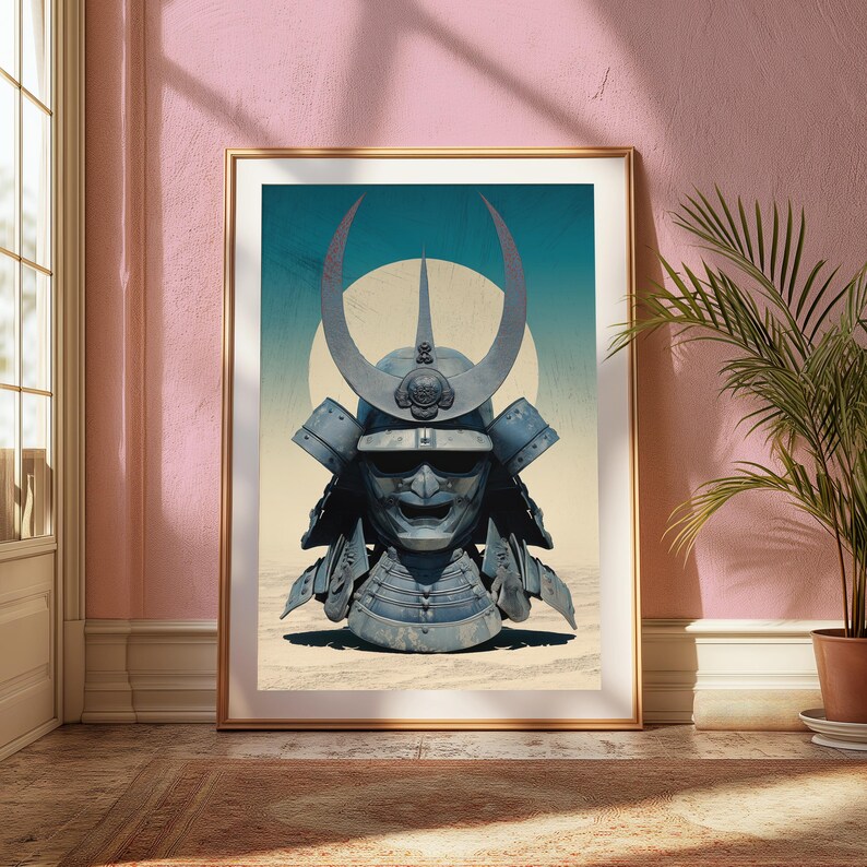 May include: A framed wall art print featuring a blue-toned samurai helmet with a prominent crescent-shaped crest. The helmet is centered against a pale yellow background with a large circular sun motif, set within a thin gold-colored frame.