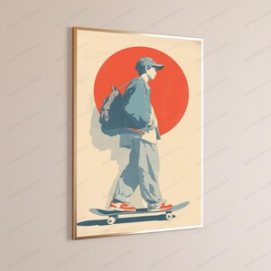 May include: A framed wall art print featuring a stylized illustration of a person wearing a baseball cap, jacket, and backpack while riding a skateboard. The background displays a large solid red circle against a light beige backdrop.