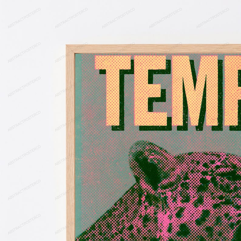 May include: A framed wall art print featuring the partial text TEMP in large, light yellow, dotted letters against a dark green background. Below the text, a stylized leopard head is depicted in a pink and dark green halftone dot pattern.