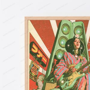 May include: A framed poster featuring a person with dark hair wearing a pink and blue striped kimono, playing a light green electric guitar. The background displays large green speakers, a red sunburst pattern, and a sign with Japanese text.