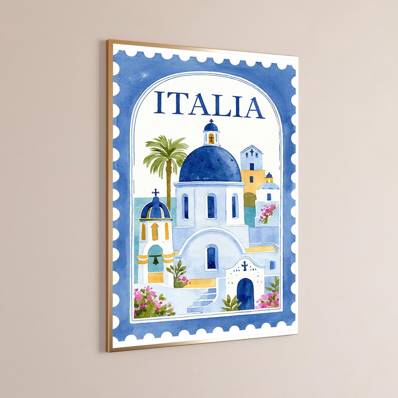 May include: A rectangular wall art print designed like a postage stamp with a blue scalloped border. The illustration features white buildings with blue domes, a palm tree, and pink flowers. The word ITALIA is printed in blue at the top center.
