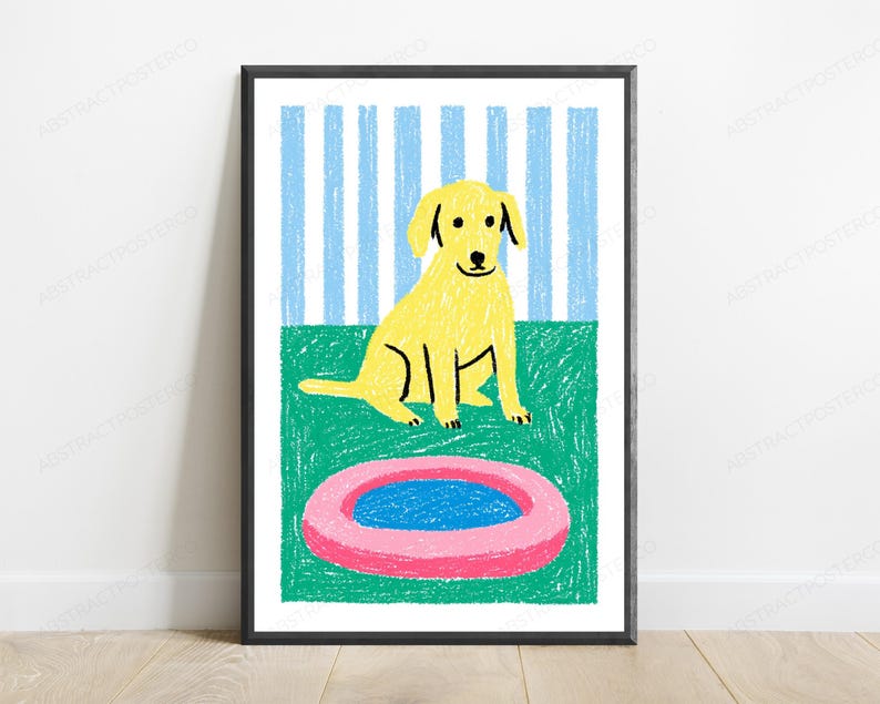 May include: A framed wall art print featuring a yellow dog sitting on a green surface in front of a blue and white striped background. In the foreground, there is a pink circular object with a blue center, rendered in a crayon-like texture.