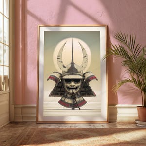 May include: A framed wall art print featuring a detailed illustration of a traditional samurai helmet with a mask. The helmet is off-white with dark grey accents and red detailing, set against a circular light background. The frame is gold-toned.