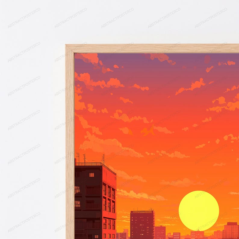 May include: A framed wall art print featuring a vibrant sunset over a city skyline. The sky is a gradient of deep purple to bright orange with scattered clouds. A large yellow sun sits above dark silhouettes of buildings and apartment blocks.