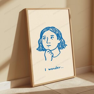 Pu&ograve; includere: Una stampa artistica da parete rettangolare incorniciata con sfondo color crema e un disegno a linee blu di una persona con i capelli corti che appoggia il mento sulla mano. Sotto l'illustrazione, il testo "I wonder..." &egrave; scritto in inchiostro blu.