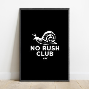 May include: A rectangular framed wall art piece featuring a black background with a white graphic illustration of a snail. Below the snail, the text reads NO RUSH CLUB in white capital letters, followed by the smaller white text NRC underneath.
