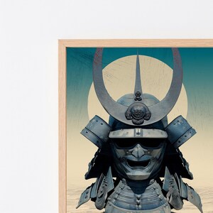 May include: A framed wall art print featuring a dark blue samurai helmet with a prominent crescent-shaped crest. The helmet is centered against a large, pale yellow circular sun set against a teal and beige gradient background with a textured finish.