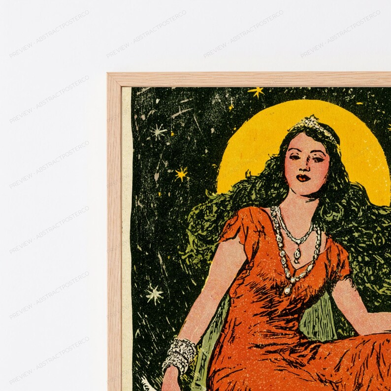 May include: A framed art print featuring a person with long dark hair wearing a tiara and an orange dress. The figure is positioned against a dark green background with white stars and a large yellow moon. The frame is made of light-colored wood.